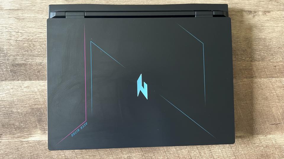 Acer Nitro 16 gaming laptop lid on a wooden table