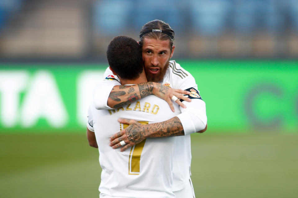 Sergio Ramos celebrates a goal and hugs Eden Hazard.