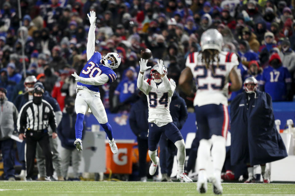 New England Patriots wide receiver Kendrick Bourne (84) makes a catch against Buffalo Bills cornerback Dane Jackson (30) during the second half of an NFL wild-card playoff football game, Saturday, Jan. 15, 2022, in Orchard Park, N.Y. (AP Photo/Joshua Bessex)