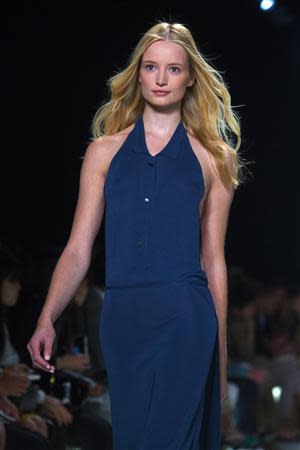 A model presents a creation from the Lacoste Spring/Summer 2014 collection during New York Fashion Week September 7, 2013. REUTERS/Eric Thayer