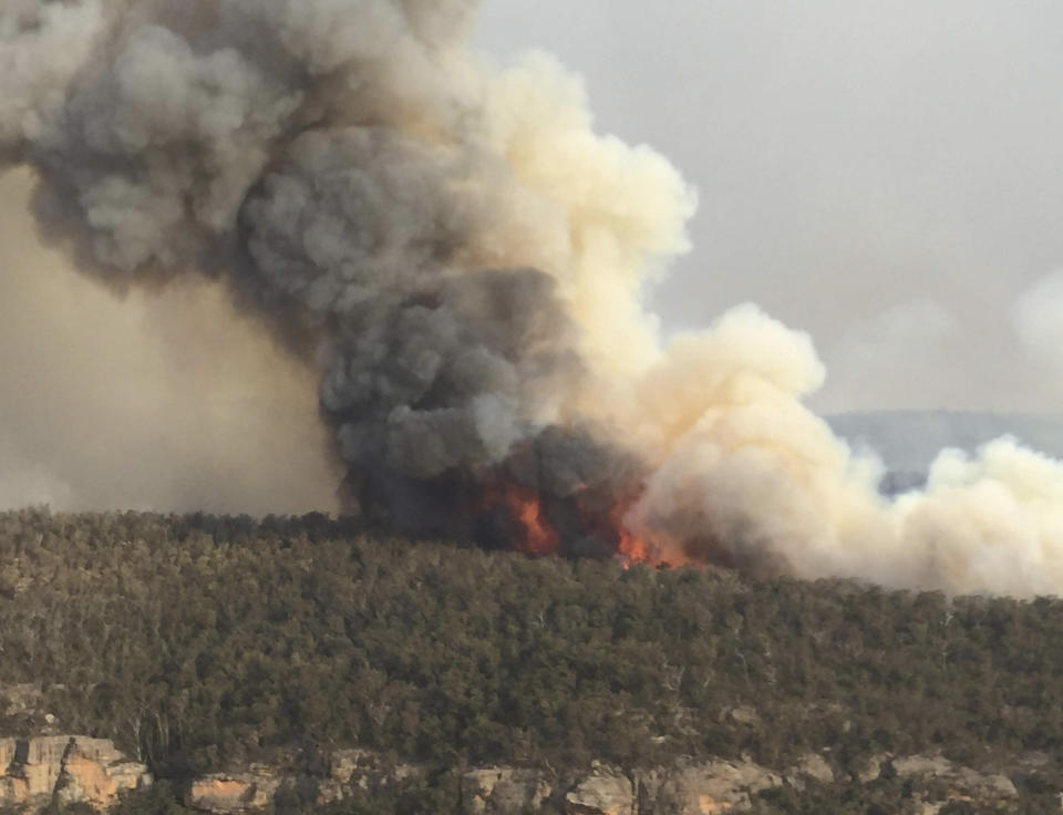 A bushfire burning out of control. Source: CPOA Brett Kennedy/Commonwealth of Australia/PA Wire 