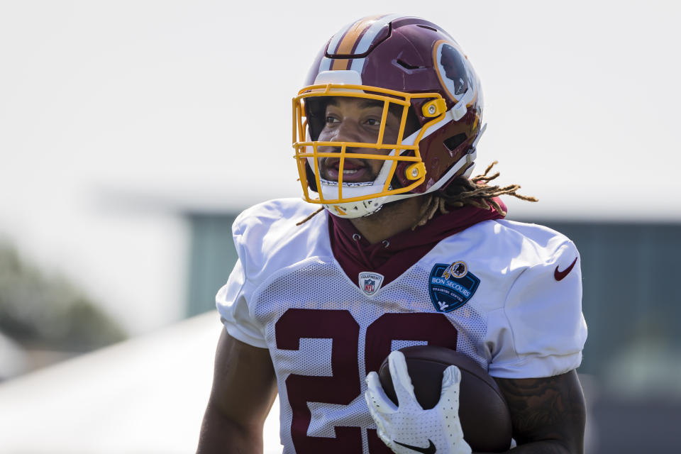 RICHMOND, VA - JULY 26: Derrius Guice #29 of the Washington Redskins runs with the ball during training camp at Bon Secours Washington Redskins Training Center on July 26, 2019 in Richmond, Virginia. (Photo by Scott Taetsch/Getty Images)