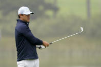 Brooks Koepka watches his shot on the 14th hole during the first round of the PGA Championship golf tournament at TPC Harding Park Thursday, Aug. 6, 2020, in San Francisco. (AP Photo/Charlie Riedel)