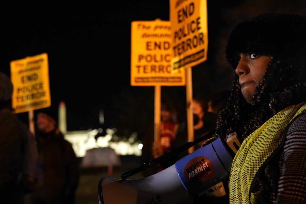 A 21-year-old woman demonstrates outside the White House over the death of Tyre Nichols, who died after being beaten by Memphis police officers on Jan. 7, 2023. (AP Photo/Jacquelyn Martin)