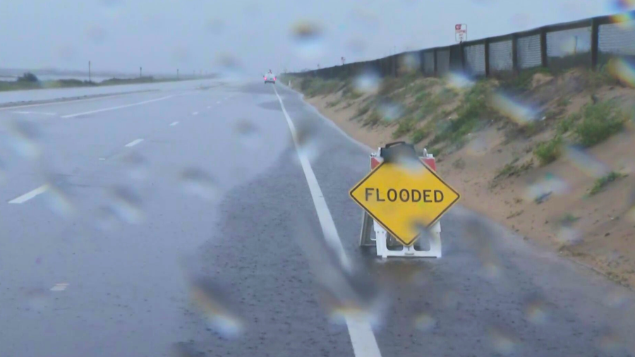 A portion of PCH was closed in Huntington Beach due to flooding in on Feb. 1, 2024.