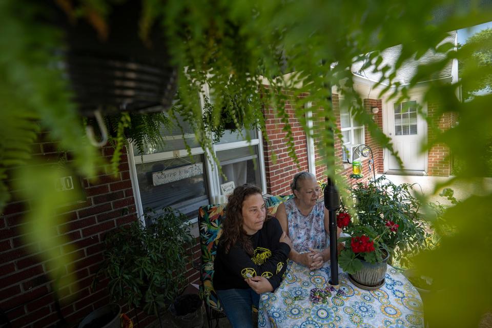 Muriah Govan and her mother, Debbie Semich, sit outside their home at Willow Brook Apartments on Thursday, July 13, 2023, in Indianapolis. Govan, who cares for her live-in parents, says property managers gave notice that she owes more than one thousand dollars, despite her showing her receipts. Govan says she's also faced plumbing and other maintenance issues that go largely unresolved. "It's just one thing after another with these people," Govan said. 