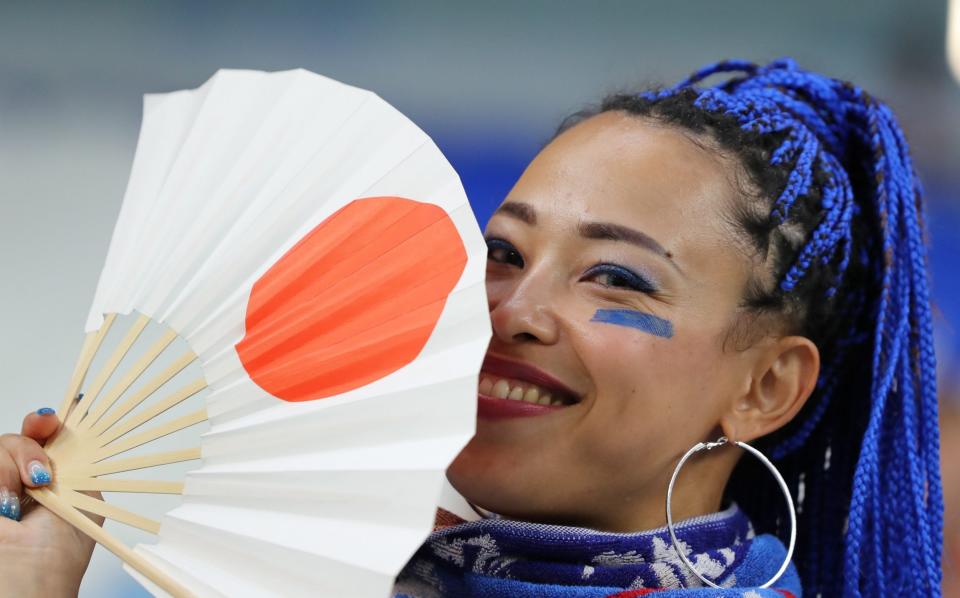 Fan with fan - Getty