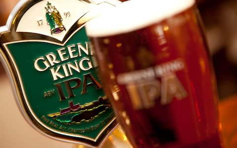 Greene King plc...A pint of Greene King IPA in a branded glass. - Credit: Newscast/Ally Carmichael