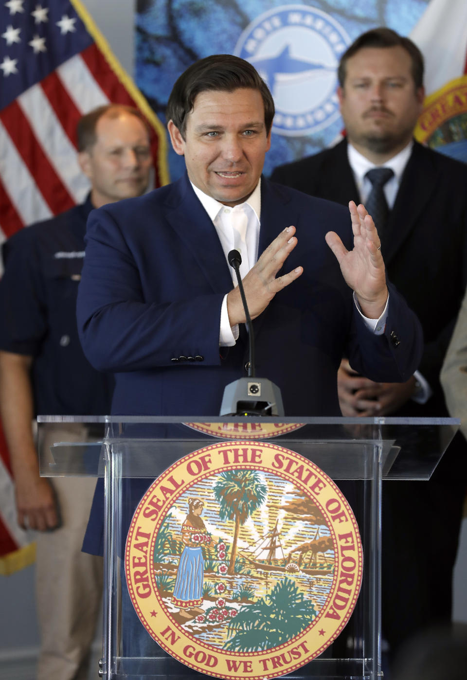 Florida Gov. Ron DeSantis speaks after signing a red tide mitigation and technology development initiative into law during a news conference at Mote Marine Laboratory Thursday, June 20, 2019, in Sarasota, Fla. DeSantis says Florida will commit $3 million a year for the next five years for the purpose of prioritizing red tide prevention. (AP Photo/Chris O'Meara)