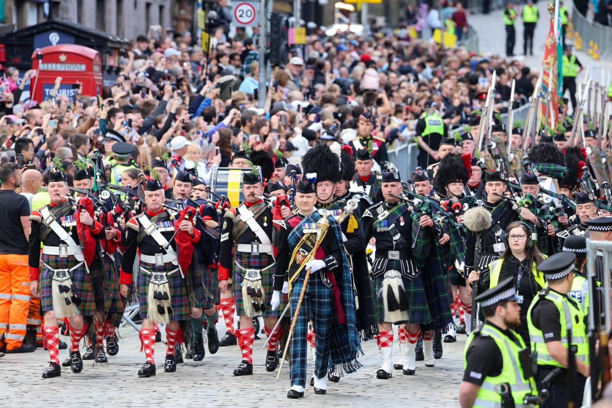 The Combined Cadet Force Pipes and Drums and the Cadet Military Band as they proceed down the Royal Mile (Chris Jackson/Getty Images)