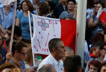 People protest against the assassination of investigative journalist Daphne Caruana Galizia last Monday, in Valletta, Malta, October 22, 2017. REUTERS/Darrin Zammit Lupi