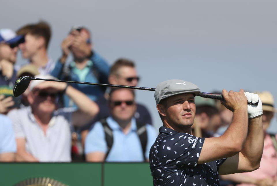 United States' Bryson DeChambeau play his tee shot at the 2nd during the first round British Open Golf Championship at Royal St George's golf course Sandwich, England, Thursday, July 15, 2021. (AP Photo/Ian Walton)