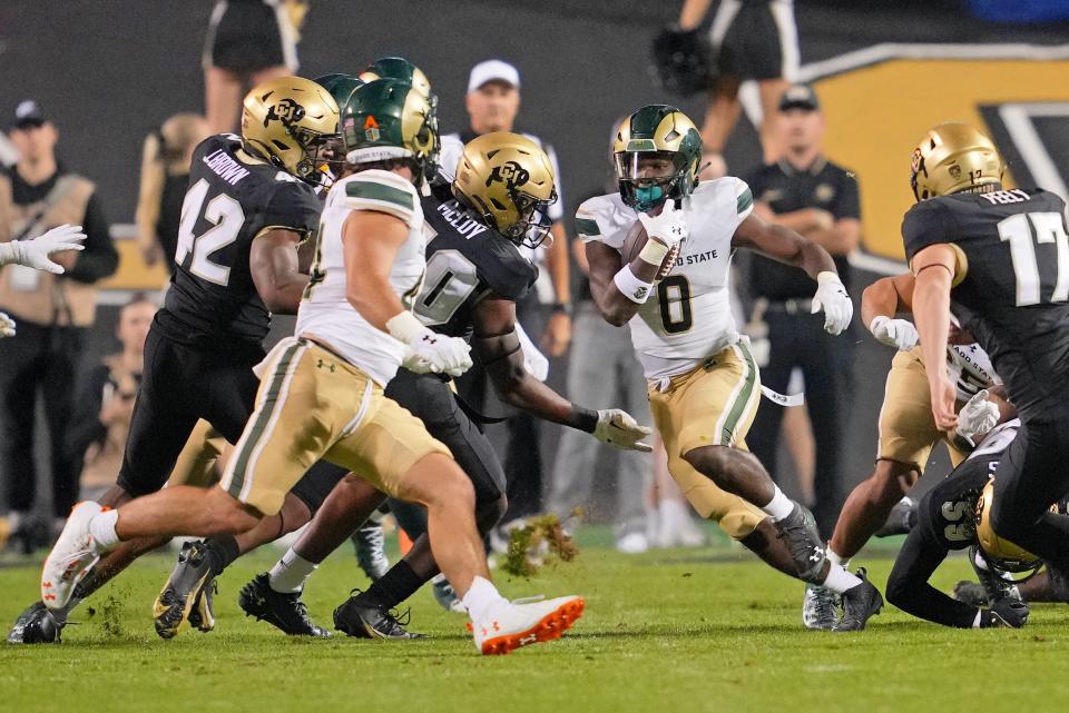 Sep 16, 2023; Boulder, Colorado, USA; Colorado State Rams running back Kobe Johnson (0) runs with the ball against the Colorado Buffaloes during the first half at Folsom Field. Mandatory Credit: Andrew Wevers-USA TODAY Sports