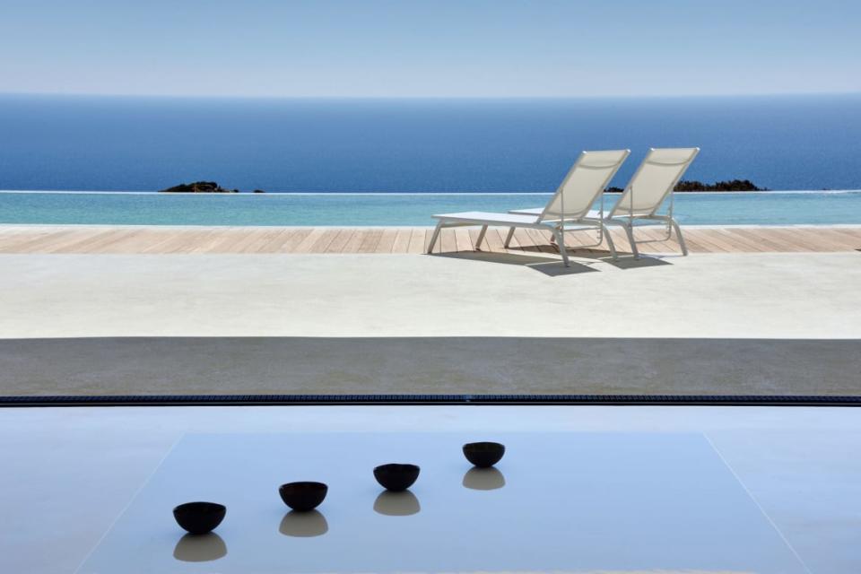 <div class="inline-image__caption"><blockquote>It’s one thing to have an <em>à la mode</em> infinity pool but it’s something else entirely when your pool appears to flow seamlessly into the Aegean Sea. Baskin the gradations of blue as you gaze out toward Crete. </blockquote></div> <div class="inline-image__credit">Sotheby's Realty</div>