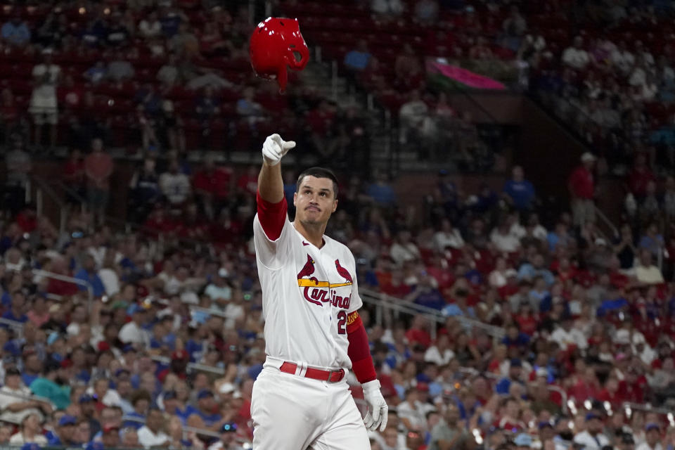 St. Louis Cardinals' Nolan Arenado tosses his helmet after striking out looking to end the eighth inning of a baseball game against the Chicago Cubs Friday, July 28, 2023, in St. Louis. (AP Photo/Jeff Roberson)