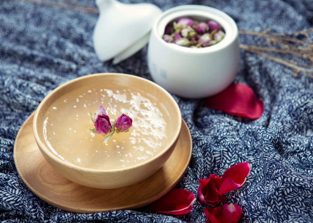 Bird's nest soup served in a wooden bowl.