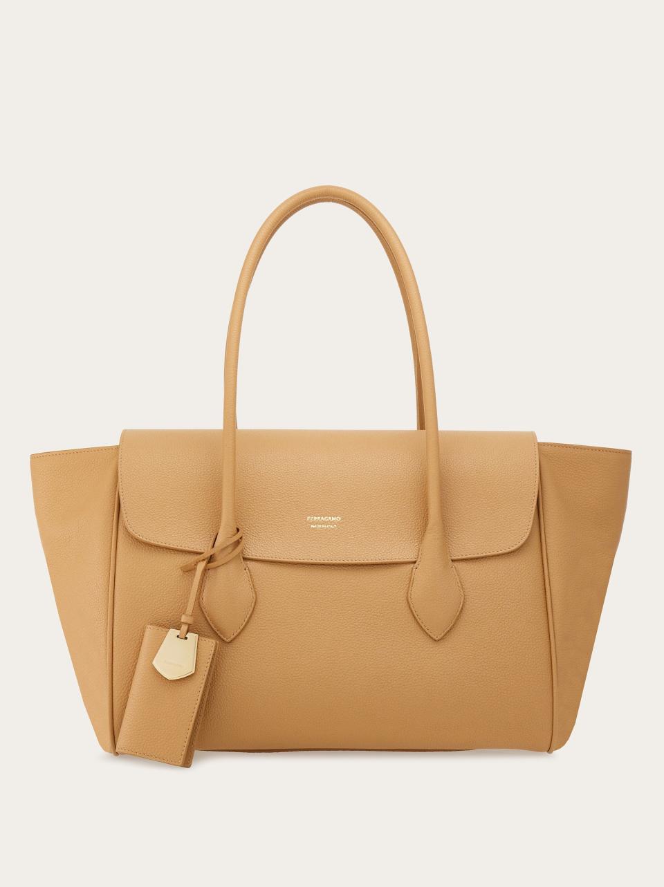 <p><a href="https://go.redirectingat.com?id=74968X1596630&url=https%3A%2F%2Fwww.ferragamo.com%2Fen-us%2Fshopping%2Feast-west-tote-bag-l-21832425&sref=https%3A%2F%2Fwww.townandcountrymag.com%2Fstyle%2Ffashion-trends%2Fg43854821%2Fbest-designer-tote-bags%2F" rel="nofollow noopener" target="_blank" data-ylk="slk:Shop Now;elm:context_link;itc:0;sec:content-canvas" class="link ">Shop Now</a></p><p>East-West tote bag (L)</p><p>ferragamo.com</p><p>$2300.00</p>