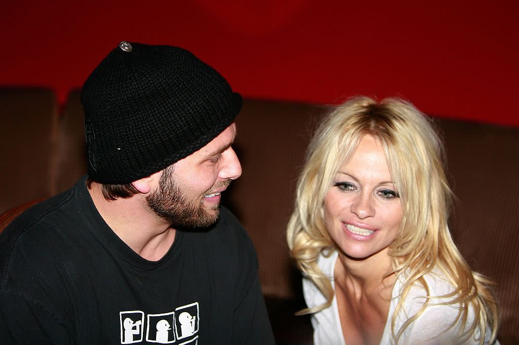 Newly married Rick Salomon(L) and Pamela Anderson (R) talk inside Tryst nightclub inside Wynn Las Vegas for a Virgin Airlines party to celebrate Virgin Airlines inaugural flight to Las Vegas on October 10, 2007 in Las Vegas, Nevada.