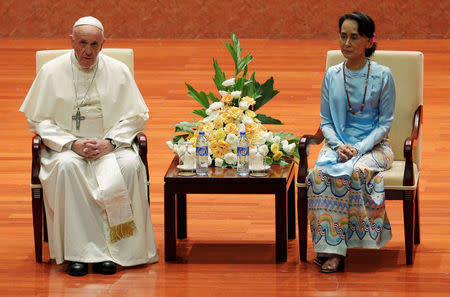 Pope Francis and Myanmar’s State Counsellor Aung San Suu Kyi attend a meeting with members of the civil society and diplomatic corps in Naypyitaw, Myanmar November 28, 2017. REUTERS/Max Rossi