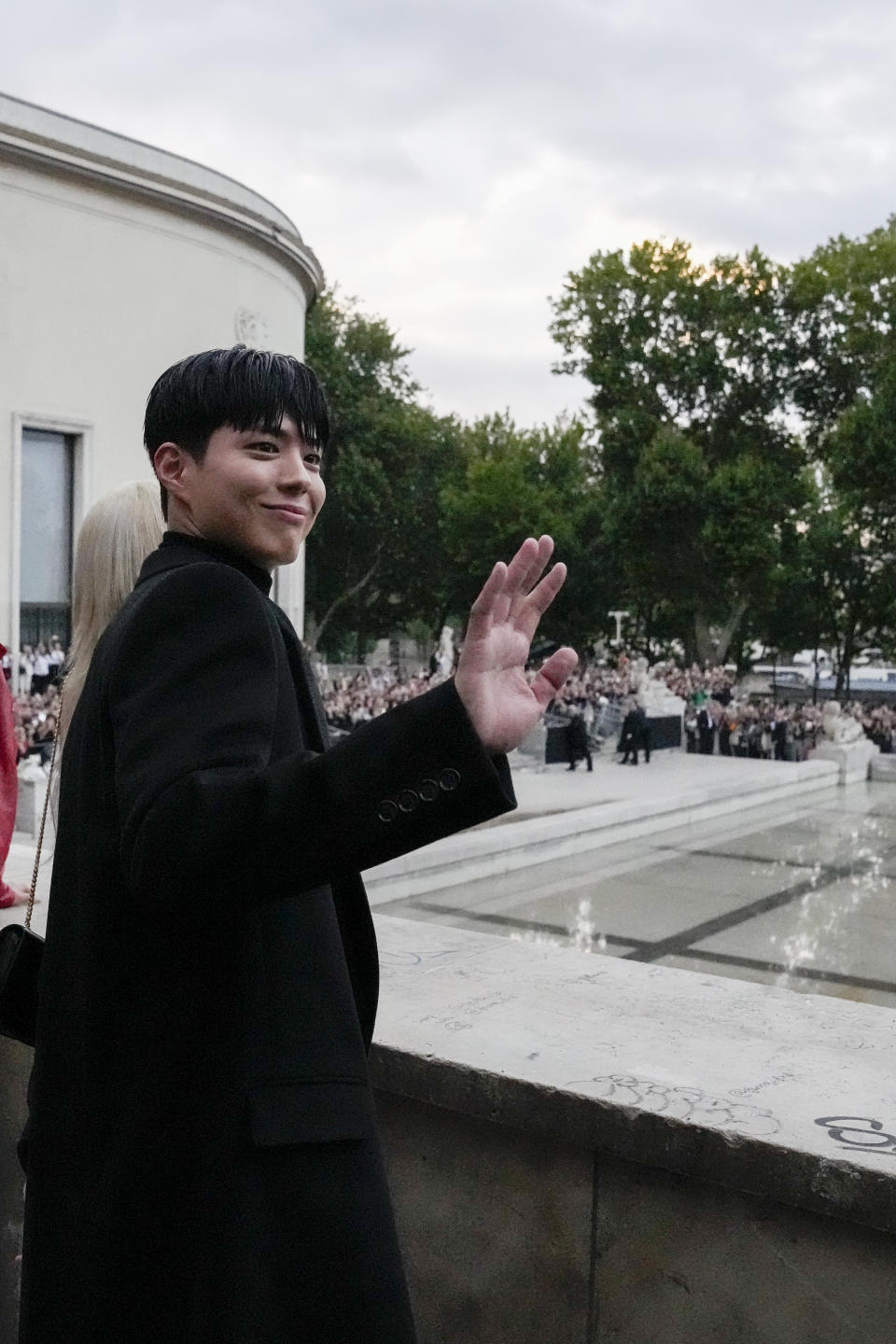 Park Bo-gum poses for photographers before the Celine men's Spring Summer 2023 collection presented in Paris, France, Sunday, June 26, 2022. (AP Photo/Francois Mori)