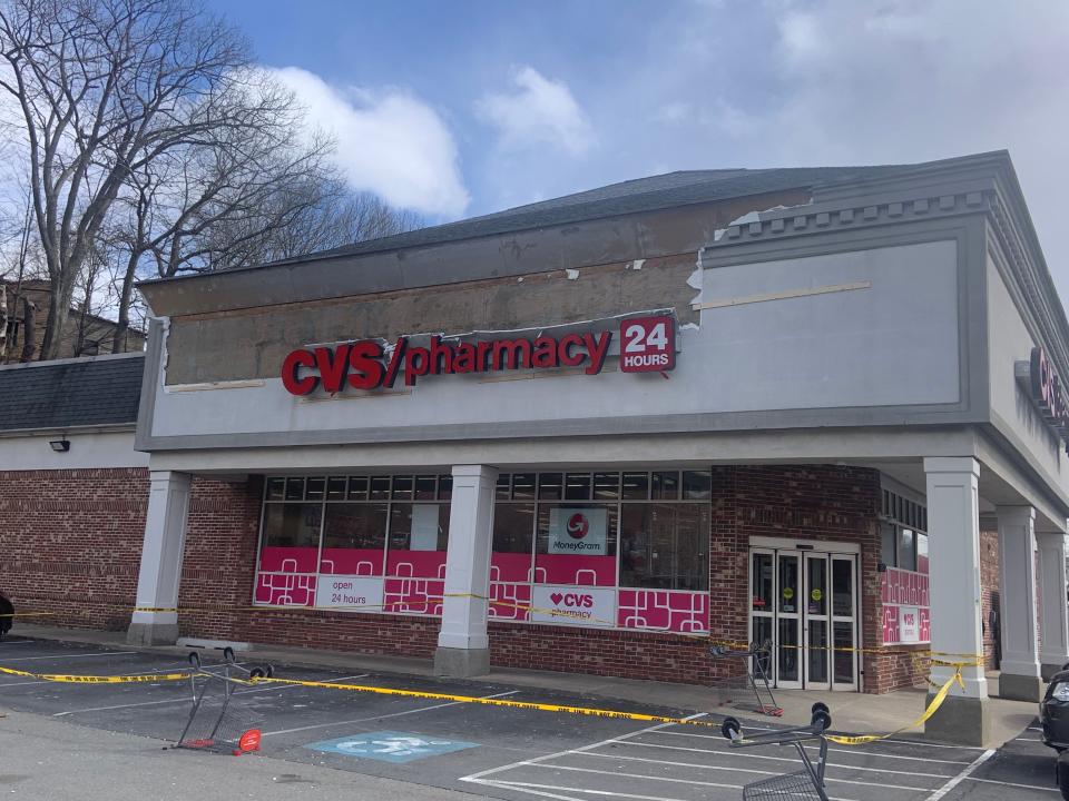 Strong winds early on Wednesday blew off a portion of the Gardner CVS's sign facade.