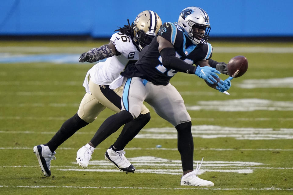 New Orleans Saints outside linebacker Demario Davis breaks up a pass intended for Carolina Panthers fullback Alex Armah during the first half of an NFL football game Sunday, Jan. 3, 2021, in Charlotte, N.C. (AP Photo/Gerry Broome)