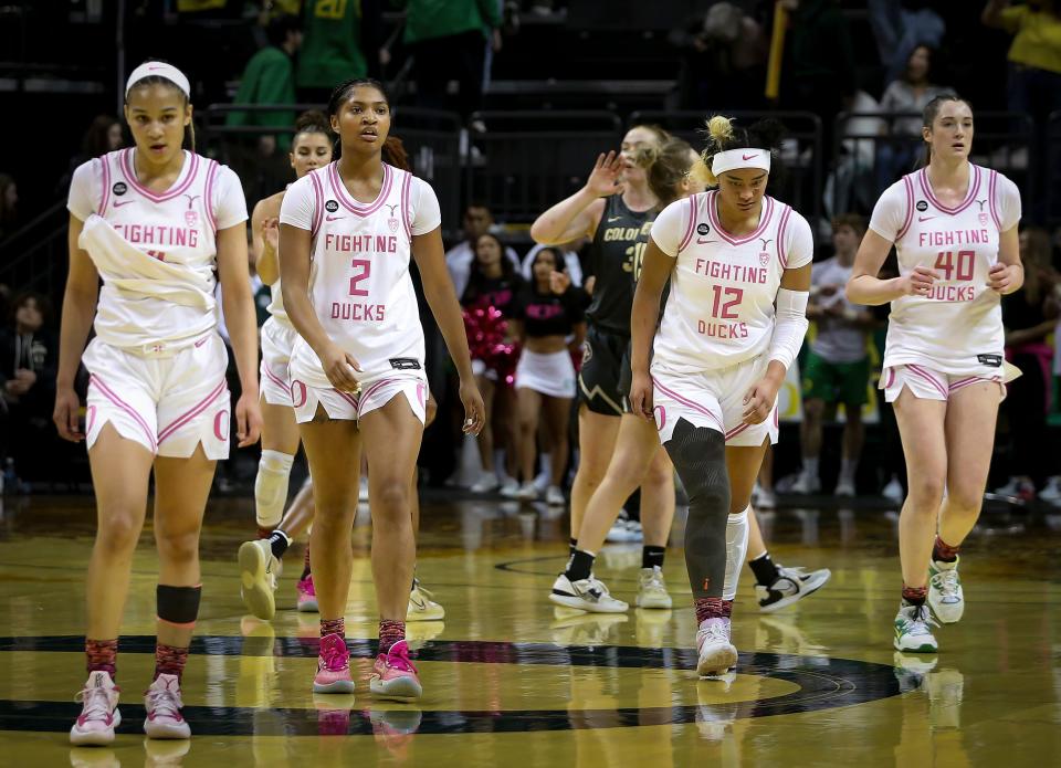 The Oregon Ducks react after the buzzer sounds on a 63-53 loss to the Colorado Buffaloes Friday, Feb. 3, 2023 at Matthew Knight Arena in Eugene, Ore. 