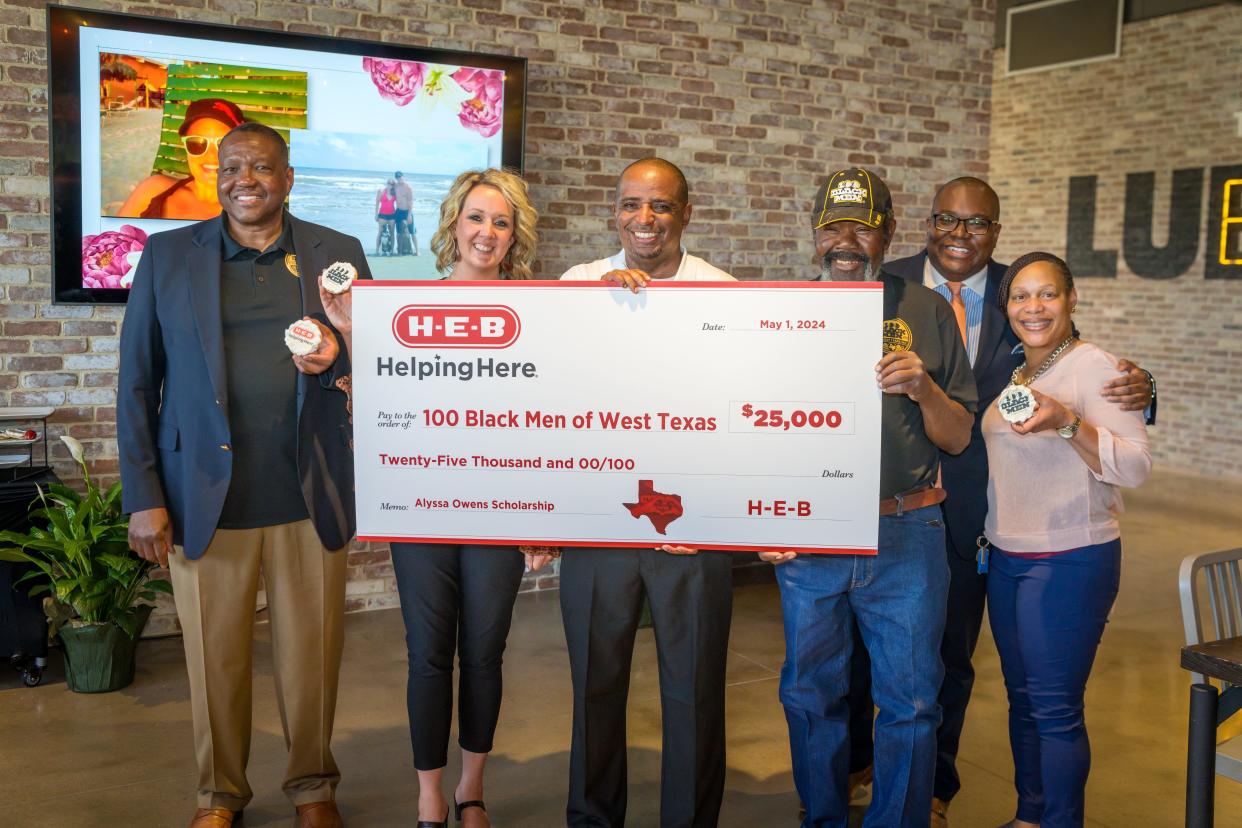 HEB officials and volunteers with the 100 Black Men of West Texas gathered Thursday at the Lubbock store as HEB presented the Lubbock-based nonprofit with a $25,000 gift this week to support the Alyssa Owens scholarship fund and other programming.
