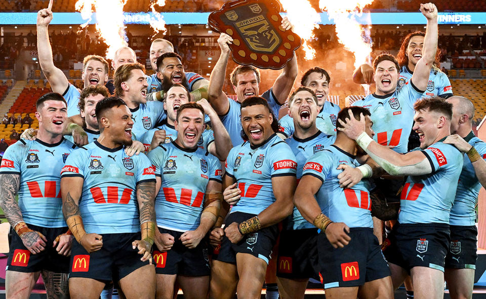 NSW players, pictured here with the State of Origin shield after Game 3.