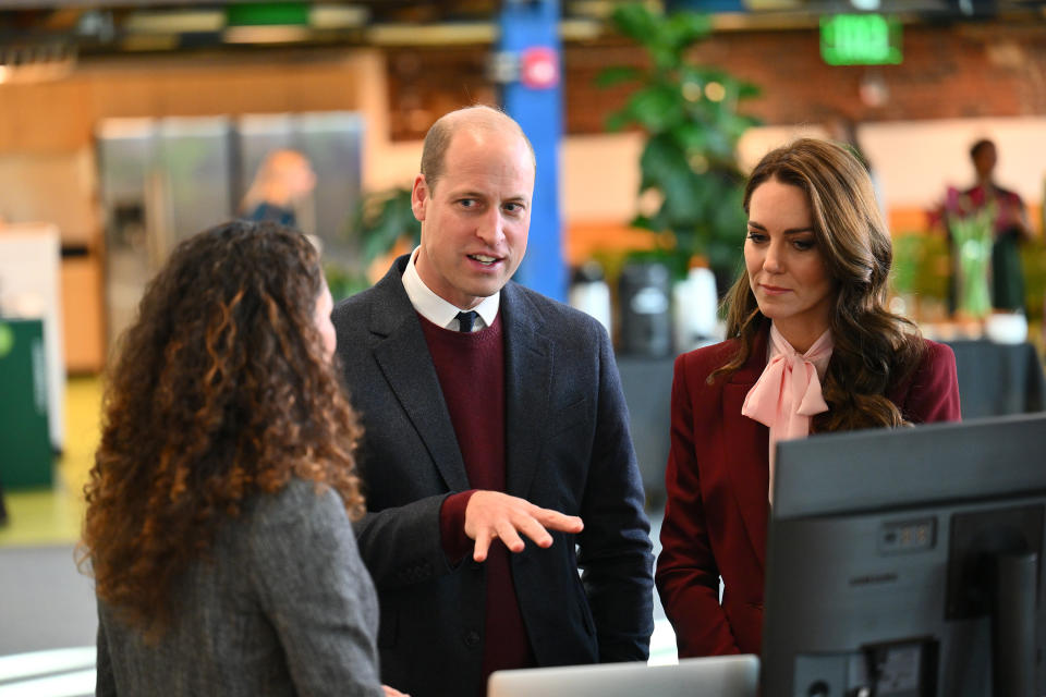 Britain's Prince William and Kate, Princess of Wales speak with startup companies that work at Greentown Labs as they tour the location for a view of green technologies developed in Somerville, Mass. Thursday, Dec. 1 2022. (Angela Weiss Pool Photo via AP)