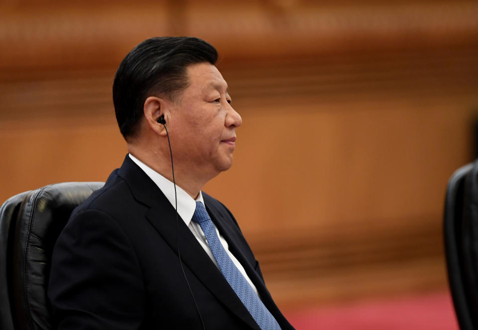 China's President Xi Jinping speaks with Japan’s Prime Minister Shinzo Abe (not pictured) during a meeting at the Great Hall of the People in Beijing, China, December 23, 2019. Noel Celis/Pool via REUTERS