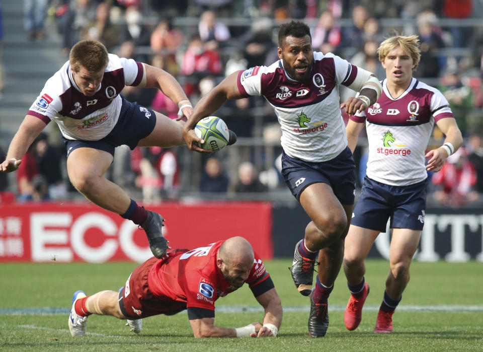 Sam Kerevi of Reds runs with the ball during their Super Rugby match against the Sunwolves in Tokyo, Saturday, March 16, 2019.(AP Photo/Koji Sasahara)