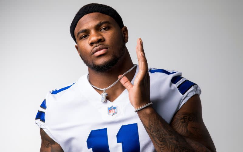 Micah Parsons in a dallas cowboy jersey wearing a GLD pendant