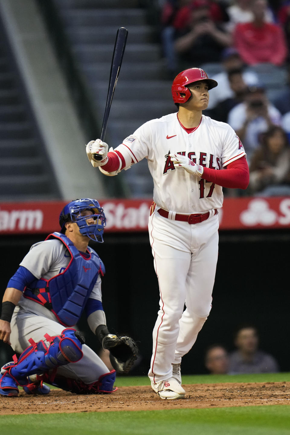 Los Angeles Angels' Shohei Ohtani (17) watches his home run against the Chicago Cubs during the fourth inning of a baseball game Tuesday, June 6, 2023, in Anaheim, Calif. (AP Photo/Jae C. Hong)