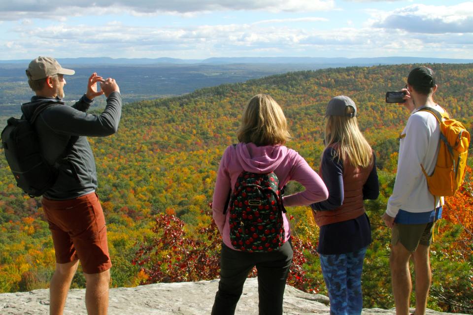 People waited on line for upwards of an hour to park and get into Minnewaska State Park Preserve in Ulster County, NY. to hike around the lake and view the gorgeous fall colors on Oct. 17, 2021.