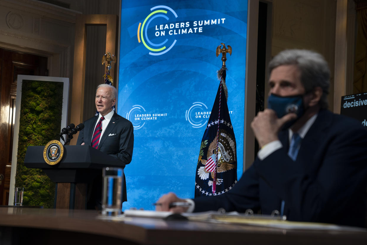 Special Presidential Envoy for Climate John Kerry listens as President Joe Biden speaks to the virtual Leaders Summit on Climate, from the East Room of the White House, Thursday, April 22, 2021, in Washington. (AP Photo/Evan Vucci)