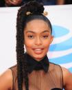 <p>Turn your braids into a power ponytail a la Yara Shahidi by making them extra long and adding a gold clasp.</p>