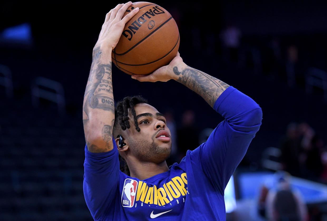 SAN FRANCISCO, CALIFORNIA - DECEMBER 25: D'Angelo Russell #0 of the Golden State Warriors warms up prior to the start of an NBA basketball game against the Houston Rockets at Chase Center on December 25, 2019 in San Francisco, California. NOTE TO USER: User expressly acknowledges and agrees that, by downloading and or using this photograph, User is consenting to the terms and conditions of the Getty Images License Agreement. (Photo by Thearon W. Henderson/Getty Images)