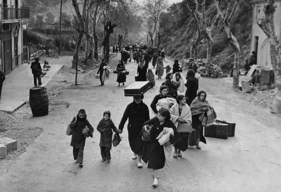 Refugees flee Paris in 1940. | FPG/Hulton Archive/Getty Images