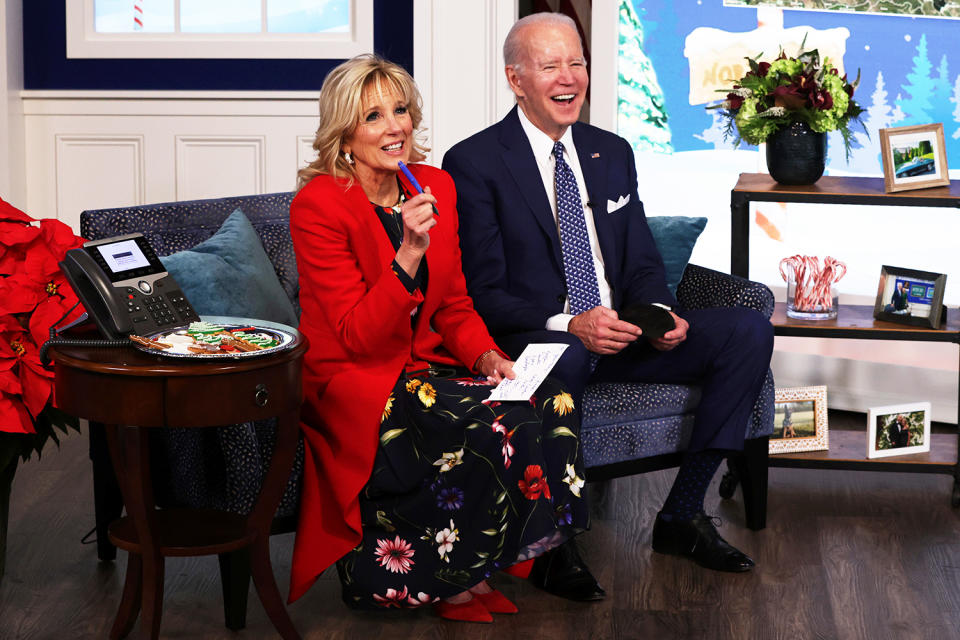 <p>President Joe Biden and First Lady Dr. Jill Biden flash smiles while participating in an event in Washington, D.C., to track the path of Santa Claus on Christmas Eve.</p>