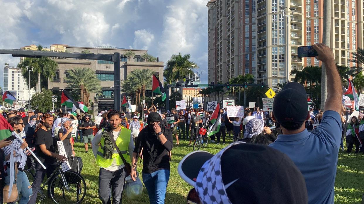 Hundreds of protesters gather Sunday afternoon on Okeechobee Boulevard in West Palm Beach to demonstrate for the Palestinian cause in the wake of the Israel-Hamas conflict. They changed along with slogans calling for the freedom of Palestine and the condemnation of President Joe Biden for his support of Israel.