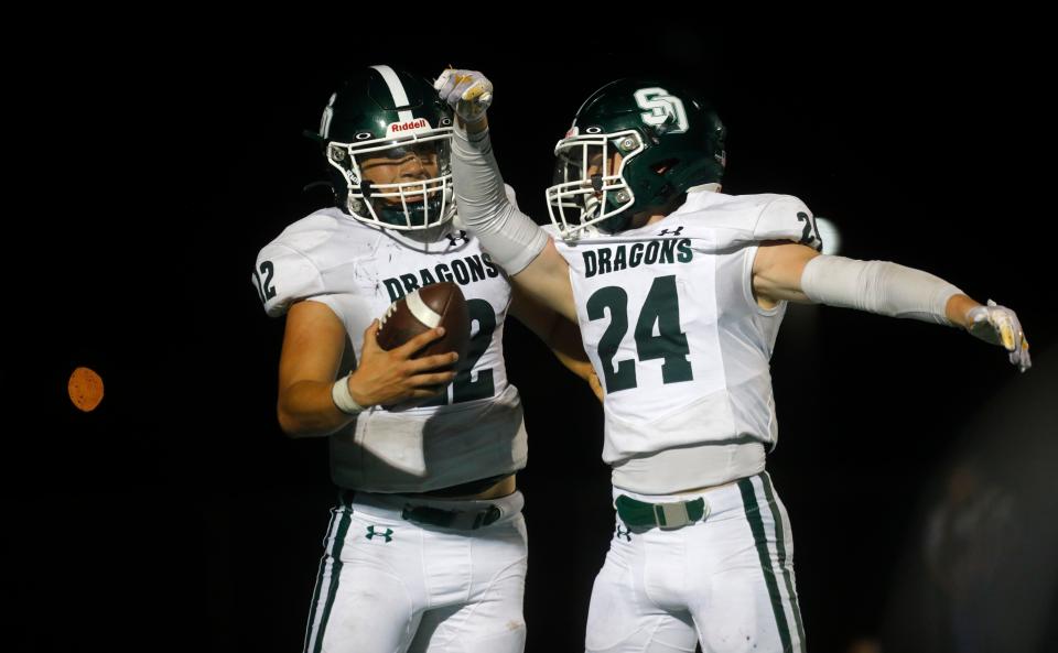 South Oldham’s Nick Hamilton and Evan Hickerson celebrate scoring a touchdown against North Oldham on Friday, Sept. 8, 2023.