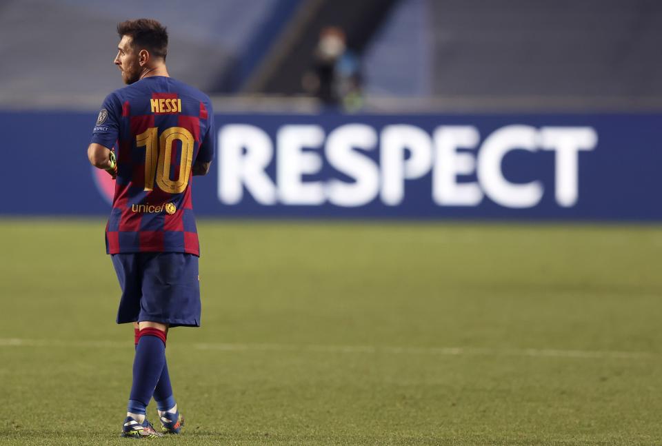 Barcelona's Lionel Messi leaves the pitch after the the Champions League quarterfinal soccer match between Barcelona and Bayern Munich in Lisbon, Portugal, Friday, Aug. 14, 2020. Bayern won the match 8-2. (Rafael Marchante/Pool via AP)