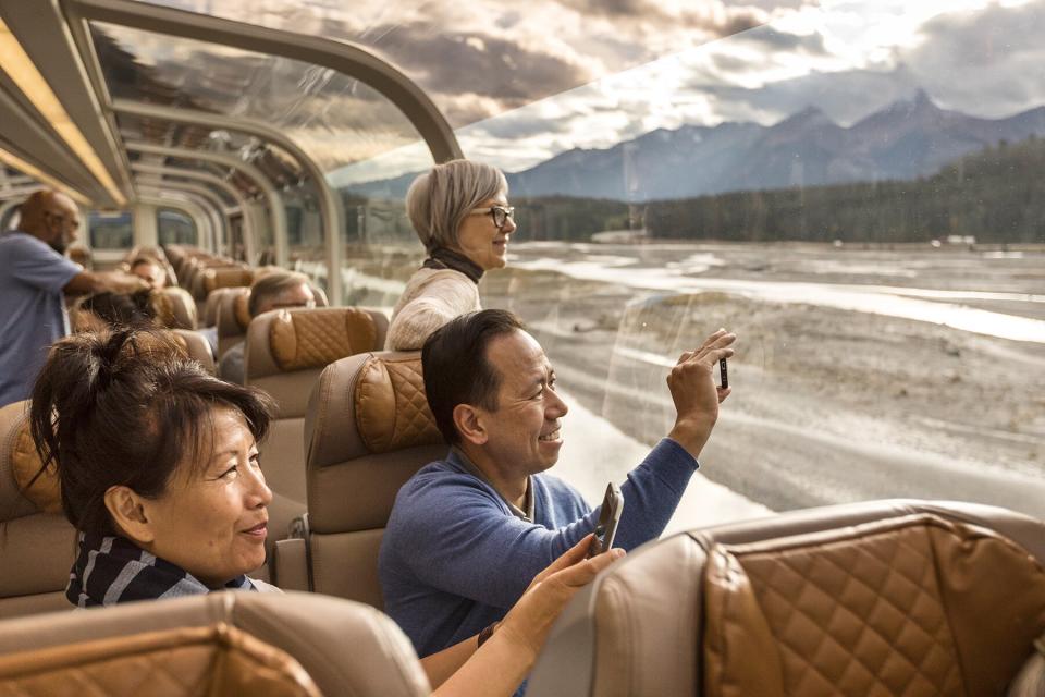 Couple takes photos from the GoldLeaf dome.