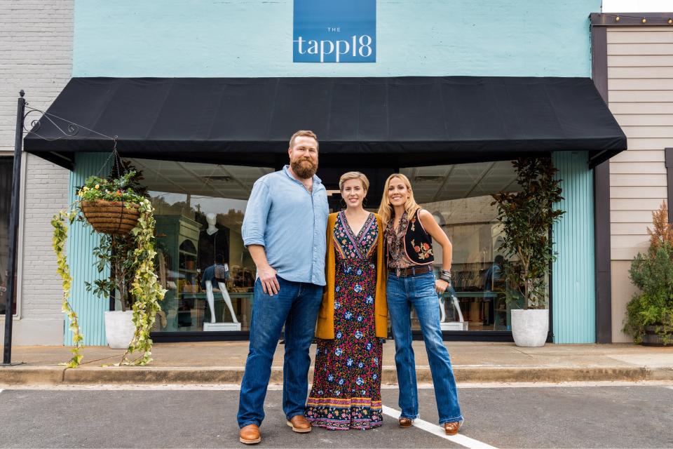 Ben and Erin with Sheryl Crow (right) pose outside the Tapp18, a boutique renovated on Home Town Takeover.