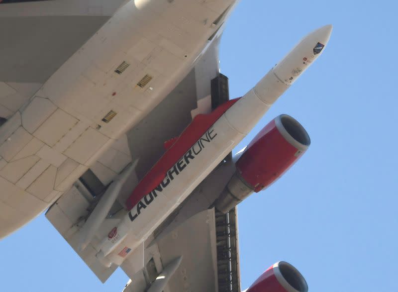 FILE PHOTO: A modified Boeing 747 takes flight carrying Virgin Orbit's LauncherOne rocket, in Mojave