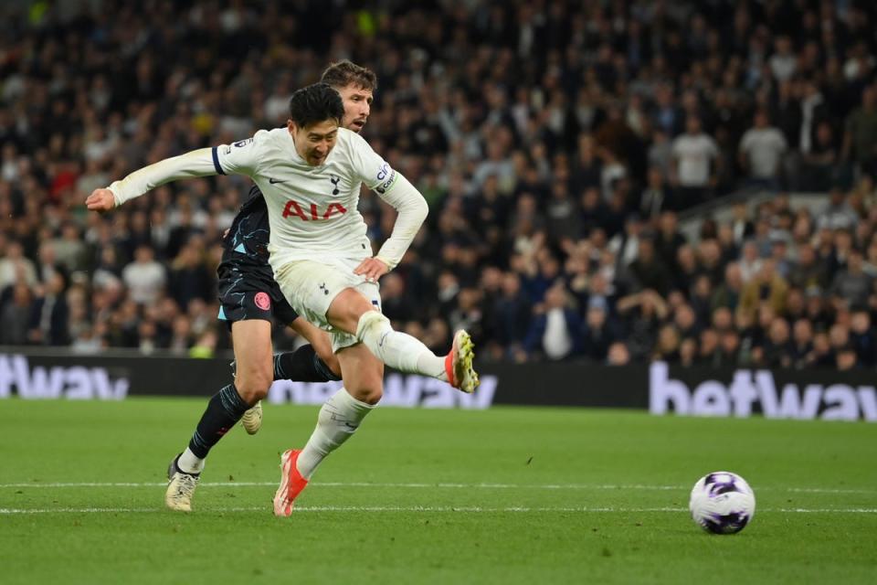 Tottenham captain Son Heung-min shoots at goal after racing through (Getty Images)