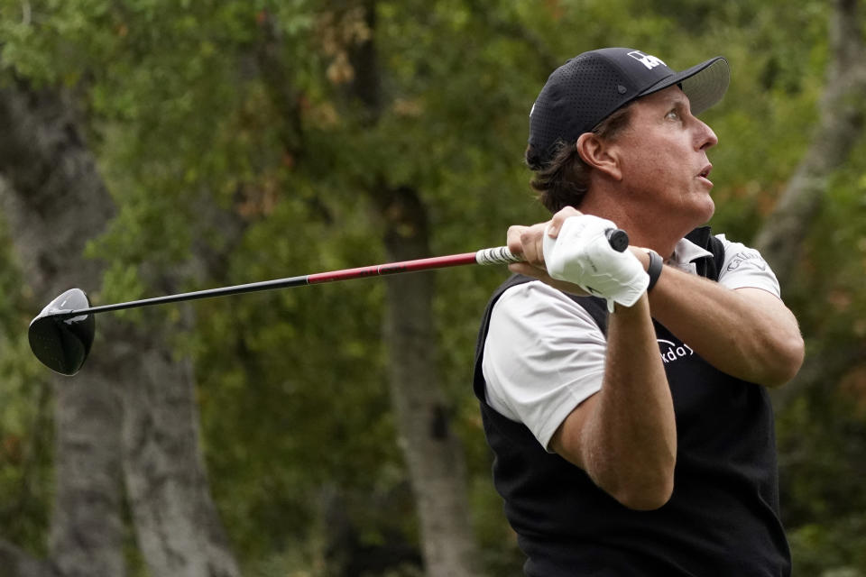 Phil Mickelson hits from the 11th tee during the second round of the Zozo Championship golf tournament Friday, Oct. 23, 2020, in Thousand Oaks, Calif. (AP Photo/Marcio Jose Sanchez)