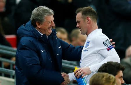 Football - England v Lithuania - UEFA Euro 2016 Qualifying Group E - Wembley Stadium, London, England - 27/3/15 England's Wayne Rooney is congratulated by manager Roy Hodgson after being substituted Reuters / Eddie Keogh Livepic