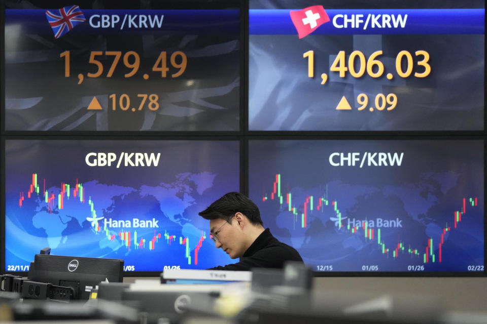A currency trader watches monitors at the foreign exchange dealing room of the KEB Hana Bank headquarters in Seoul, South Korea, Wednesday, Feb. 22, 2023. Asian shares declined Wednesday after stocks tumbled on Wall Street as worries persist about higher interest rates and their tightening squeeze on the global economy. (AP Photo/Ahn Young-joon)